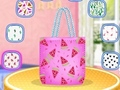 Spel Baba Taylor Handsak Ontwerper  aanlyn